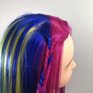 finished fishtail braid on rainbow hair